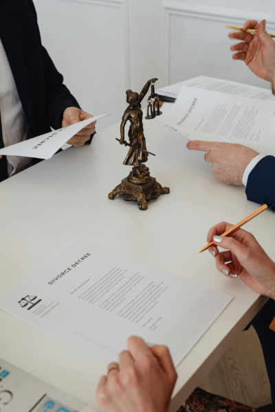 hands doing legal paperwork