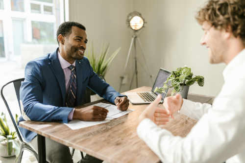 2 men having a meeting